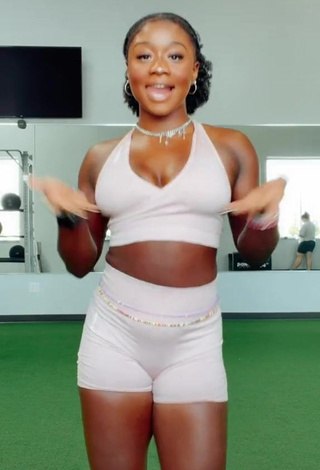 3. Hot Aba Asante Shows Cleavage in White Sport Bra