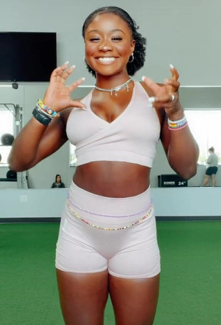 4. Hot Aba Asante Shows Cleavage in White Sport Bra