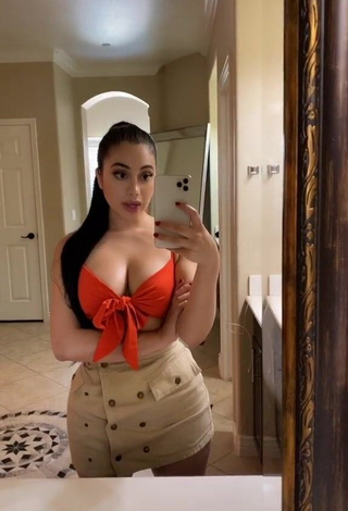 1. Hottie Jailyne Ojeda Ochoa Shows Cleavage in Orange Crop Top