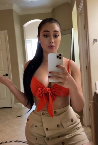 3. Hottie Jailyne Ojeda Ochoa Shows Cleavage in Orange Crop Top