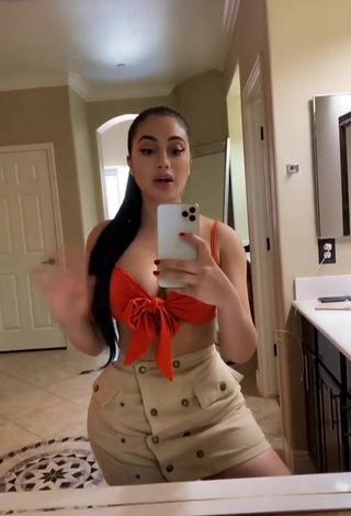 4. Hottie Jailyne Ojeda Ochoa Shows Cleavage in Orange Crop Top