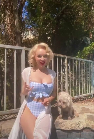 Desirable Jasmine Chiswell Shows Cleavage in Checkered Swimsuit at the Swimming Pool