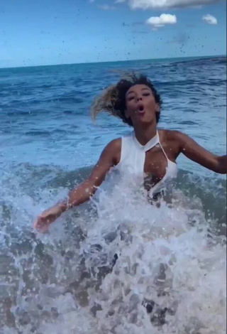 3. Hot Jena Shows Cleavage in White Dress at the Beach