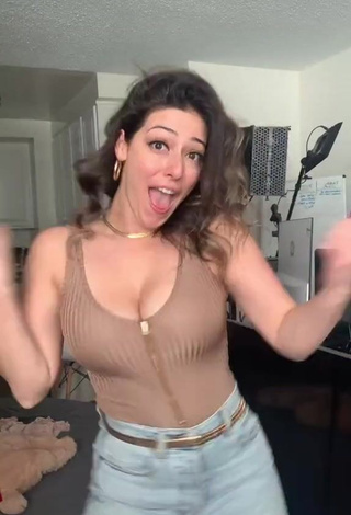 1. Desirable Josette Pimenta Shows Cleavage in Beige Top and Bouncing Tits