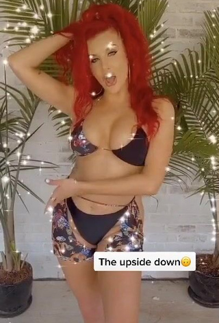 3. Hottie Justina Valentine Shows Cleavage in Bikini