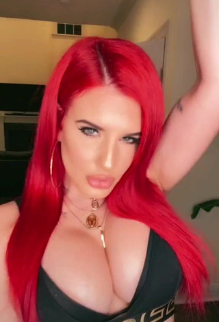 4. Sweetie Justina Valentine Shows Cleavage in Black Crop Top