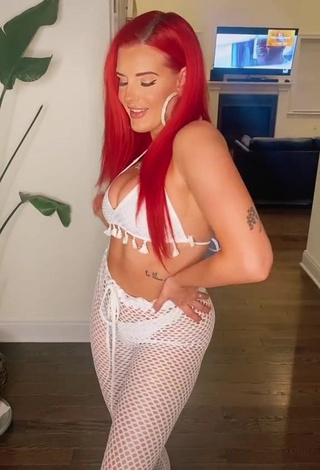 1. Cute Justina Valentine Shows Cleavage in White Crop Top