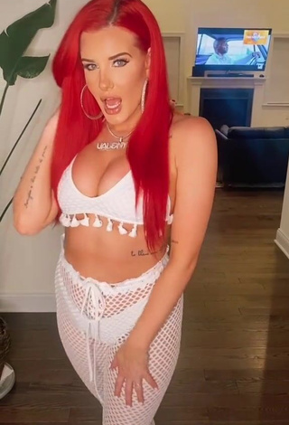 4. Cute Justina Valentine Shows Cleavage in White Crop Top