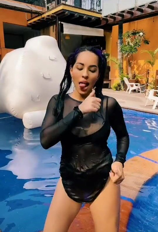 3. Sexy Karla Bustillos Shows Cleavage in Black Bikini