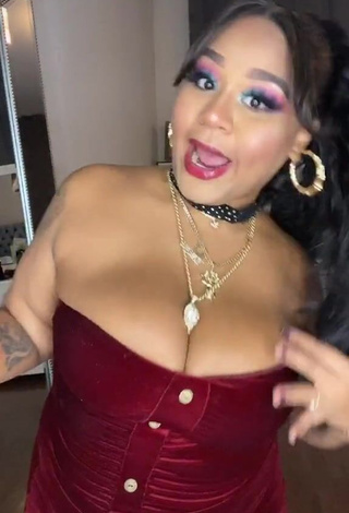 Sexy Carol Acosta Shows Cleavage in Red Dress