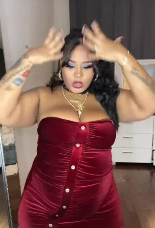 3. Hot Carol Acosta Shows Cleavage in Red Dress