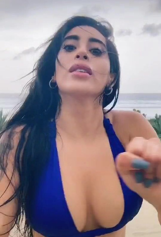 Hot Kim Shantal Shows Cleavage in Blue Bikini Top