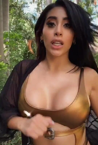 4. Cute Kim Shantal Shows Cleavage in Golden Swimsuit