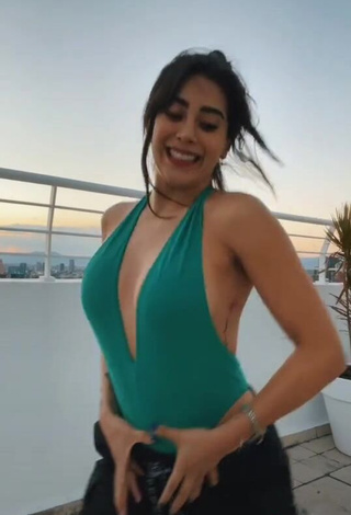 4. Sexy Kim Shantal Shows Cleavage in Green Swimsuit