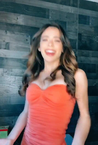 3. Cute Lauren Kettering Shows Cleavage in Orange Dress