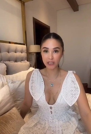 1. Hot Heart Evangelista Shows Cleavage in White Dress