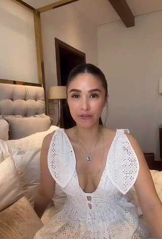 3. Hot Heart Evangelista Shows Cleavage in White Dress