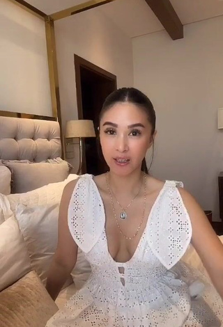 4. Hot Heart Evangelista Shows Cleavage in White Dress