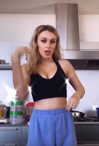 3. Hot Madi Monroe Shows Cleavage in Black Crop Top