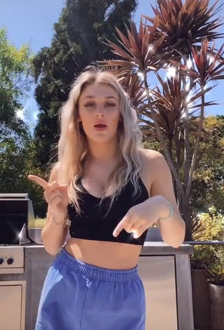 Sexy Madi Monroe Shows Cleavage in Black Crop Top