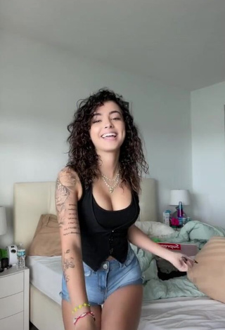 1. Hottie Malu Trevejo Shows Cleavage in Black Top