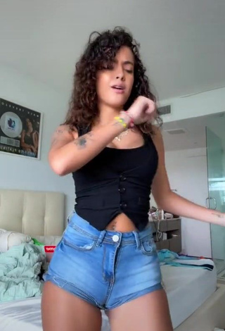 3. Sexy Malu Trevejo Shows Cleavage in Black Top