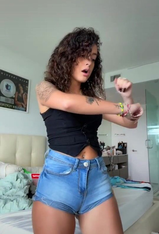 4. Sexy Malu Trevejo Shows Cleavage in Black Top