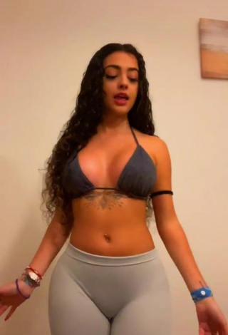 3. Cute Malu Trevejo Shows Cleavage in Grey Bikini Top while doing Belly Dance