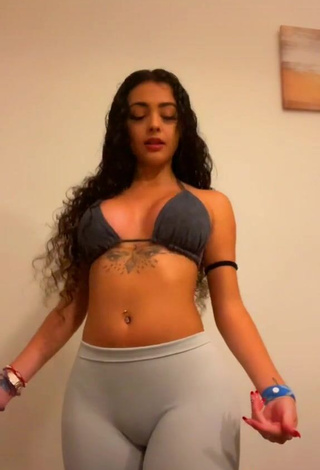 4. Cute Malu Trevejo Shows Cleavage in Grey Bikini Top while doing Belly Dance