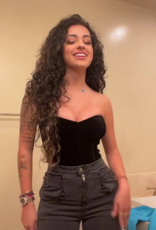 1. Cute Malu Trevejo Shows Cleavage in Black Top