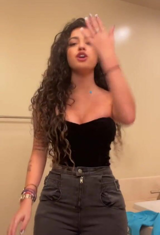 4. Cute Malu Trevejo Shows Cleavage in Black Top