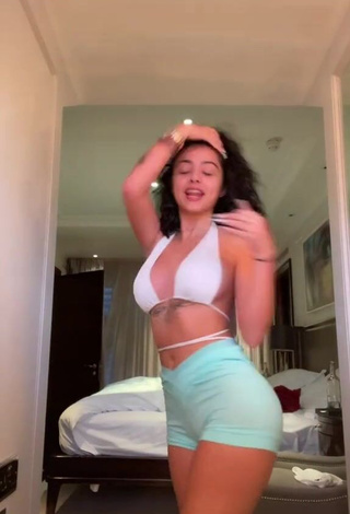 1. Breathtaking Malu Trevejo in White Bikini Top