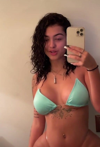 Cute Malu Trevejo Shows Cleavage in Light Green Bikini