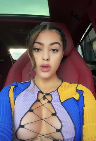 Cute Malu Trevejo Shows Cleavage in Crop Top