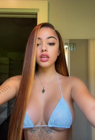 1. Seductive Malu Trevejo Shows Cleavage in Blue Bikini Top