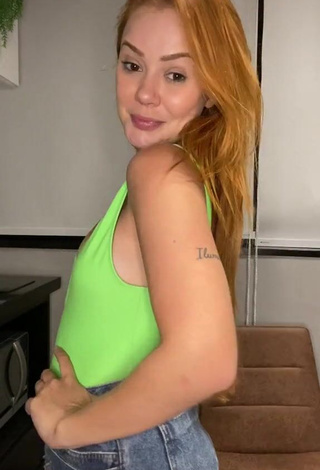 Hot Mirela Janis Shows Cleavage in Green Top