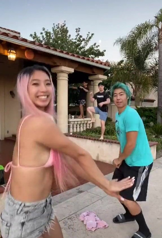 3. Hot Michelle Chin in Pink Bikini Top (Underboob)