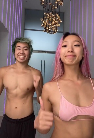 1. Desirable Michelle Chin in Pink Bikini Top (Underboob)