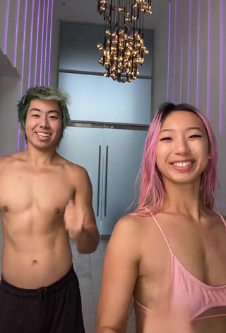 Desirable Michelle Chin in Pink Bikini Top (Underboob)