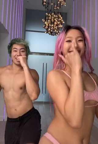 4. Desirable Michelle Chin in Pink Bikini Top (Underboob)