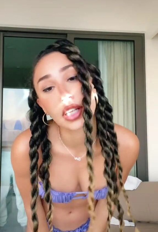 3. Hottie Eva Gutowski Shows Cleavage in Purple Bikini