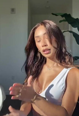 Hot Eva Gutowski Shows Cleavage in White Sport Bra