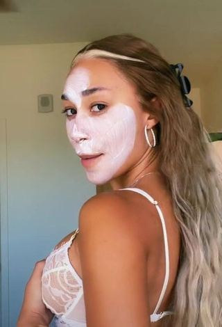 Hot Eva Gutowski Shows Cleavage in White Bra