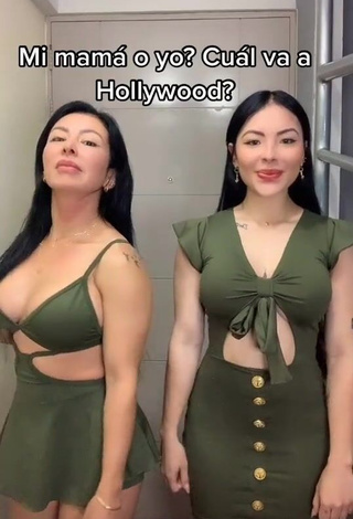 1. Hot Natalia Shows Cleavage in Olive Dress