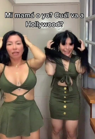 3. Hot Natalia Shows Cleavage in Olive Dress