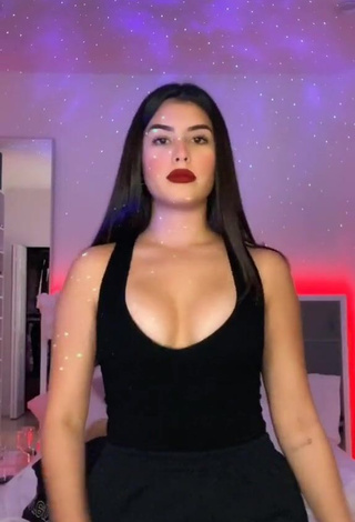 3. Sexy Nicole García Shows Cleavage in Black Top