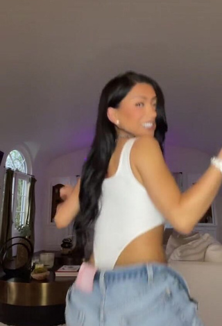 Hot Nikita Dragun Shows Cleavage in White Bodysuit