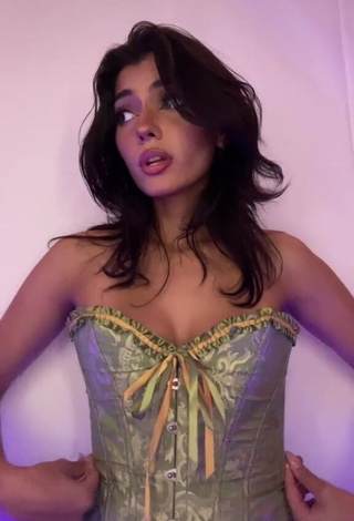 Hot Noor Dabash Shows Cleavage in Corset