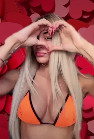 1. Hot Pabllo Vittar Shows Cleavage in Orange Bikini Top