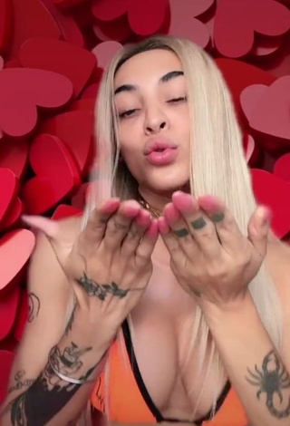 Hot Pabllo Vittar Shows Cleavage in Orange Bikini Top